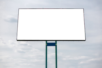 Obraz premium Empty billboard blank for advertising, on background of cloudy sky.