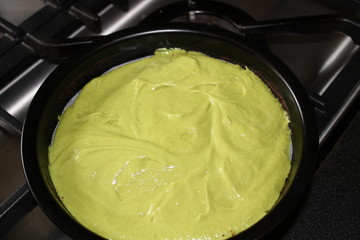 baking a multicoloured cake