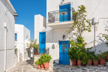 Fototapeta na wymiar View of a narrow street in old town of Naoussa, Paros island, Cyclades