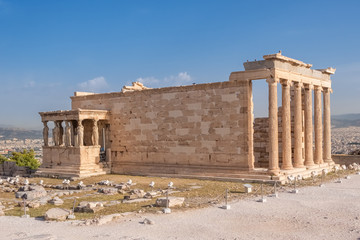 Obraz premium Ruins of the Temple of Erechtheion at the Acropolis hill in Athens