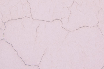 Pink pastel colour cracked wall background