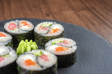 Yin Yang rolls close-up on shale Board