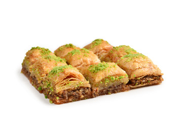 Pistachio baklava on a white background. Dessert.
