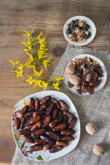 bowl of mixed dry fruits and nuts on wooden table