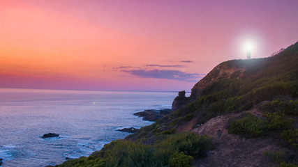 sunset on coast of sea