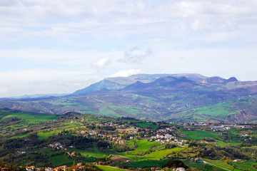 Fototapeta na wymiar View of the valley of Italy from the top of the state of San Marino