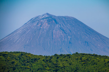 Naklejka na ściany i meble Mount Oldonyo le Ngai the only active volcano in Tanzania