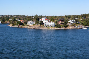 Fototapeta na wymiar Small Swedish settlements are on coastline of Stockholm archipelago in Baltic sea, Sweden, Scandinavia