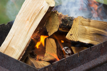 Burning firewood open flame close