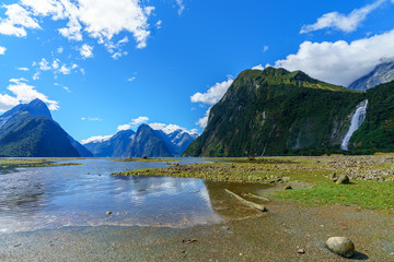 big waterfall at milford sound, fiordland, new zealand 21