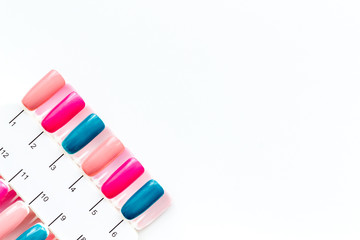 decorative cosmetics set with palette for manicure on white background top view space for text