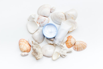 Dead Sea cosmetics with natural ingredients on white table background top view