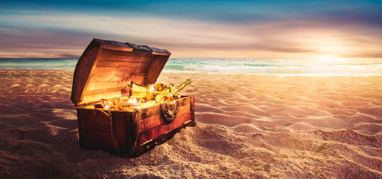 treasure chest at the beach by sunset