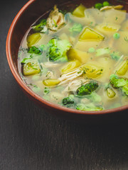 soup with broccoli, green peas and vegetables and other - concept. food background. top view