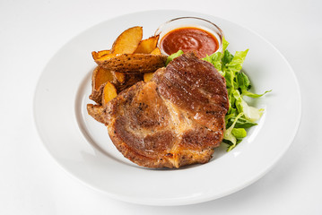 steak with baked potatoes and salad