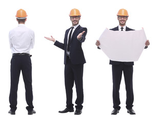 in full growth .a qualified architect in an orange helmet