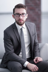 Portrait of an attractive businessman wearing glasses