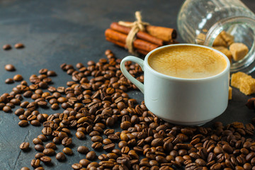 coffee fresh and hot in a white cup, aroma. serving of beverage (coffee grain). food. top view. copy space