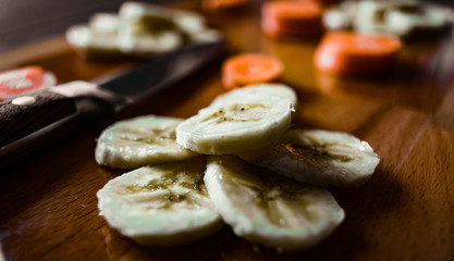 Slices of bananas and carrots