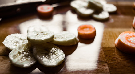 Slices of bananas and carrots