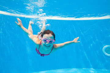 girl swim in  pool