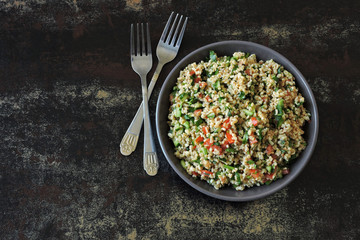 Middle Eastern salad with bulgur and vegetables. Tabbouleh salad.
