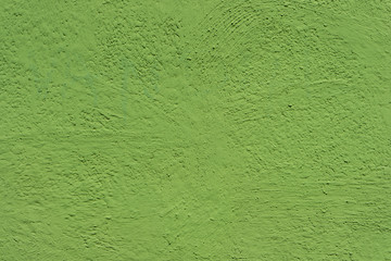 Wall painted in green. Bright green grungy back