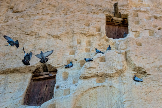 An ancient tradition, naturally cool stone carved warehouses along with many pigeon lofts in Ermenek, Turkey