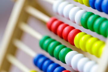 Colorful vintage style wooden abacus. For Learning Basic Mathematics Calculator - Close up