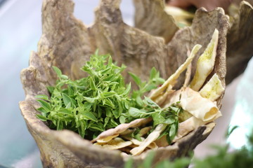 salad and bread in a bowl