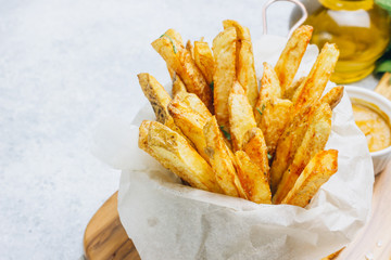 French fries in basket with mustard sauce