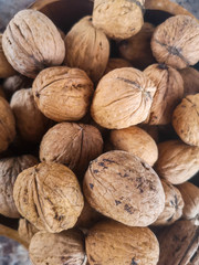 Nice walnuts on black background. Close up.
