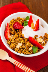 Strawberry Cinnamon Granola Yogurt Breakfast. Selective focus.