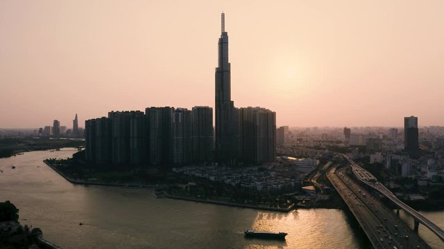 4k Aerial drone footage - Beautiful skyline of Saigon (Ho Chi Minh City) at sunset.  Vietnam, Asia