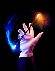 magician hand and wand floating in the air