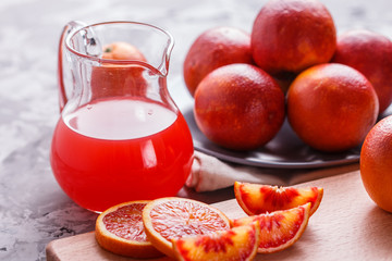 blood orange and juice on a dark background