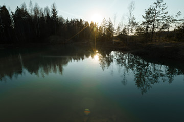 Beautiful turquoise lake in Latvia - Meditirenian style colors in Baltic states - Lackroga ezers