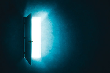 open door in a dark room