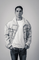 Fashion portrait of Attractive young man model posing happy and sexy for the camera
