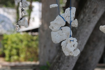 White Coral Mobile under the Tree by the White Sand Beach, Summer Holidays