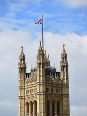 Fototapeta na wymiar english parliament building and the flag