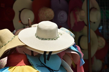 Hats and clothes in the grocery store For use when traveling and strolling along the beach by the...