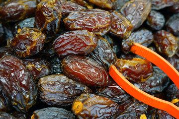 Dried sweet dates in bulk at a food market