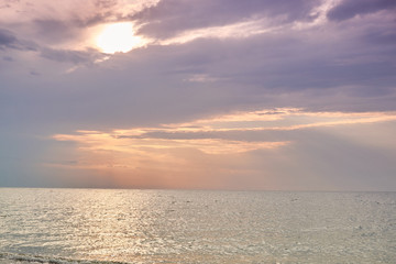 Fototapeta premium sunset and beach sunset shoot. Dramatic sky with clouds