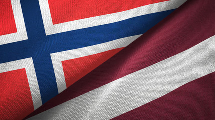 Norway and Latvia two flags textile cloth, fabric texture