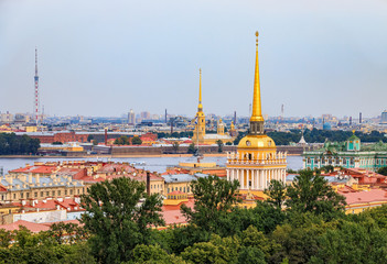 Fototapeta na wymiar City skyline with the Admiralty spire, Peter and Paul Fortress, river Neva and Hermitage Winter Palace in Saint Petersburg, Russia