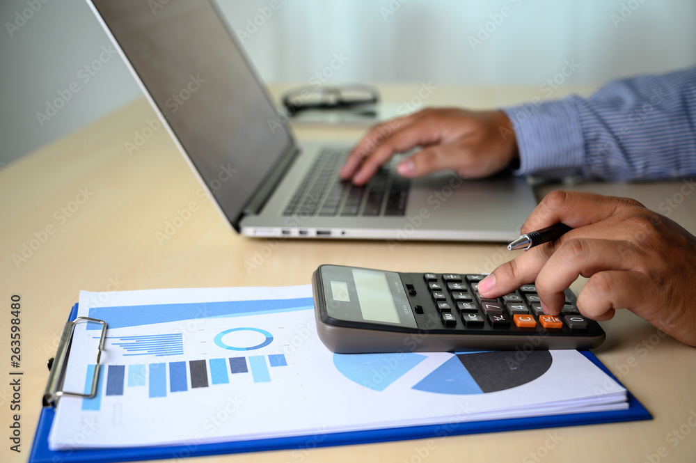 Poster man hands typing on computer laptop desktop with female hands working on modern laptop
