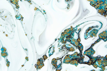 Beautiful abstract painting is a painting technique Ebru .Turkish Ebru style on the water with acrylic paints wring wave.Stylish combination of luxury.Contemporary art marble liquid texture  