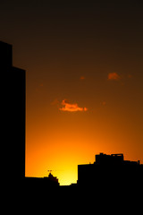 Fototapeta premium silhouette of city at sunset