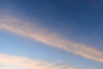Naklejka na ściany i meble colorful cloud above twilight sky